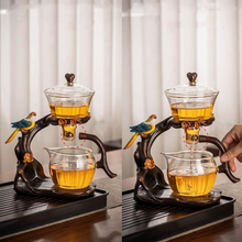Load image into Gallery viewer, Lazy Kungfu Glass Tea Set Creative Bird Semi Automatic Drip Diversion Rotating Bowl with Infuser Teapot Set