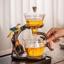 Load image into Gallery viewer, Lazy Kungfu Glass Tea Set Creative Bird Semi Automatic Drip Diversion Rotating Bowl with Infuser Teapot Set
