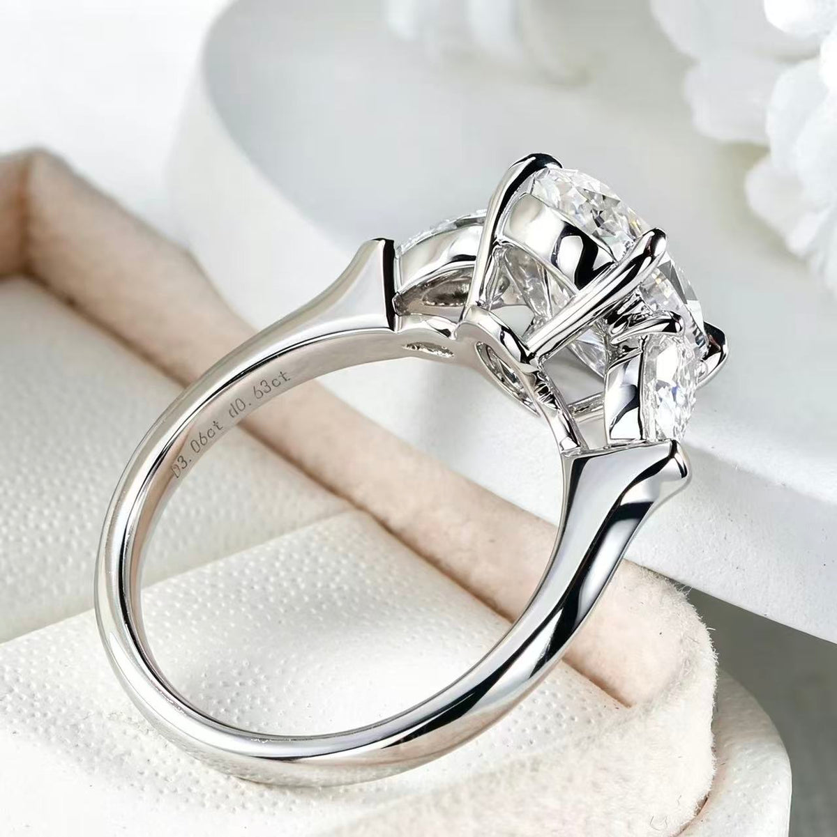 Oval shaped three stone design