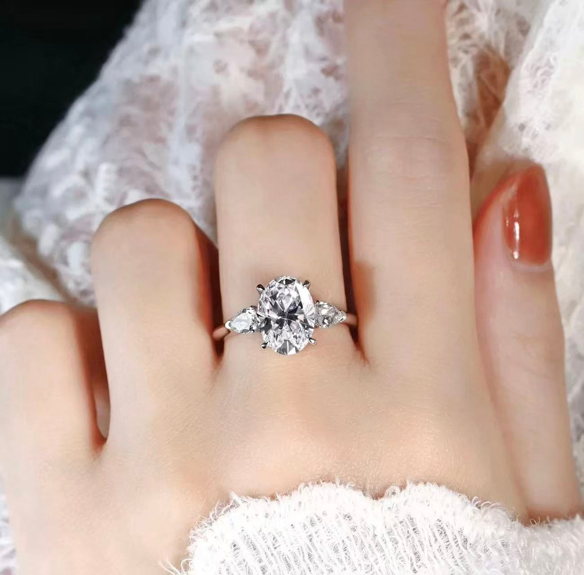 Oval shaped three stone design