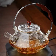 Görseli Galeri görüntüleyiciye yükleyin, Electromagnetic circuit dedicated high-temperature resistant thickened lifting beam steaming and boiling tea pot with a large capacity of 1000ml