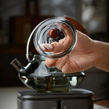 Görseli Galeri görüntüleyiciye yükleyin, Electromagnetic circuit dedicated high-temperature resistant thickened lifting beam steaming and boiling tea pot with a large capacity of 1000ml