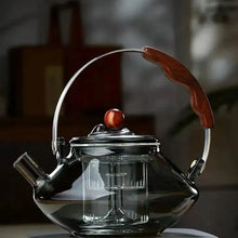 Görseli Galeri görüntüleyiciye yükleyin, Electromagnetic circuit dedicated high-temperature resistant thickened lifting beam steaming and boiling tea pot with a large capacity of 1000ml