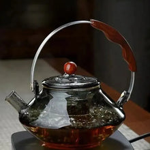 Görseli Galeri görüntüleyiciye yükleyin, Electromagnetic circuit dedicated high-temperature resistant thickened lifting beam steaming and boiling tea pot with a large capacity of 1000ml